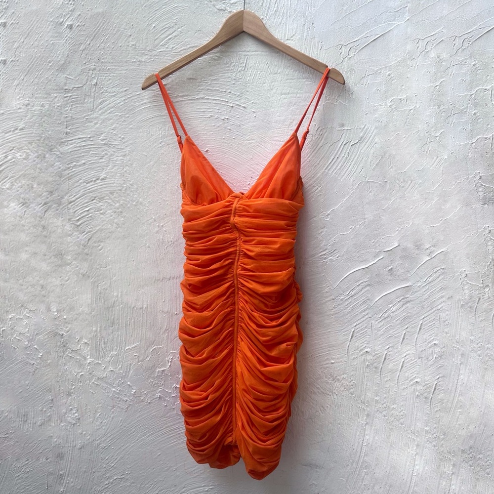 Orange mistress rocks cocktail dress